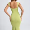 Aelia Modal-Kleid mit Rüschen, Metallverzierungen und Cut-outs in Olivgrün Aelia Modal-Kleid mit Rüschen, Metallverzierungen und Cut-outs in Olivgrün