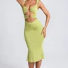Aelia Modal-Kleid mit Rüschen, Metallverzierungen und Cut-outs in Olivgrün Aelia Modal-Kleid mit Rüschen, Metallverzierungen und Cut-outs in Olivgrün