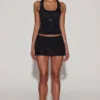 Aine Jersey-Oberteil mit Rundhalsausschnitt und Racerback in Schwarz Aine Jersey-Oberteil mit Rundhalsausschnitt und Racerback in Schwarz