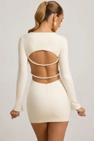 Akari Minikleid mit Perlenverzierung und Cut-outs in Elfenbein