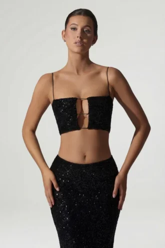 Ariana Oberteil mit Cut-outs und Verzierungen in Schwarz