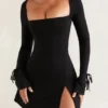 Baize Minikleid mit quadratischem Ausschnitt und langen Ärmeln in Schwarz Baize Minikleid mit quadratischem Ausschnitt und langen Ärmeln in Schwarz