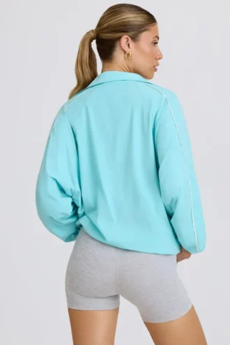 Übergroße Trainingsjacke in Aqua