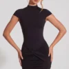Blair Jersey-Minikleid mit Rollkragen, gerafftem Rücken und rückenfreiem Ausschnitt in Schwarz Blair Jersey-Minikleid mit Rollkragen, gerafftem Rücken und rückenfreiem Ausschnitt in Schwarz