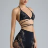 Liberty Bikini-Oberteil mit verzierten Kreuzbändern in Schwarz Liberty Bikini-Oberteil mit verzierten Kreuzbändern in Schwarz