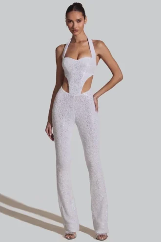 Coralena Jumpsuit mit Verzierungen und Cut-outs in Weiß Coralena Jumpsuit mit Verzierungen und Cut-outs in Weiß