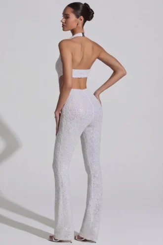 Coralena Jumpsuit mit Verzierungen und Cut-outs in Weiß Coralena Jumpsuit mit Verzierungen und Cut-outs in Weiß