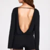 Dara Modal-Jumpsuit mit langen Ärmeln und rückenfreiem Ausschnitt in Schwarz Dara Modal-Jumpsuit mit langen Ärmeln und rückenfreiem Ausschnitt in Schwarz