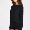 Dara Modal-Jumpsuit mit langen Ärmeln und rückenfreiem Ausschnitt in Schwarz Dara Modal-Jumpsuit mit langen Ärmeln und rückenfreiem Ausschnitt in Schwarz