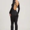 Eulalie Jumpsuit aus geschmeidigem Jersey mit Schleifendetail in Schwarz Eulalie Jumpsuit aus geschmeidigem Jersey mit Schleifendetail in Schwarz