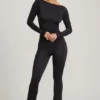 Eulalie Jumpsuit aus geschmeidigem Jersey mit Schleifendetail in Schwarz Eulalie Jumpsuit aus geschmeidigem Jersey mit Schleifendetail in Schwarz
