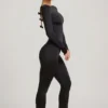 Eulalie Jumpsuit aus geschmeidigem Jersey mit Schleifendetail in Schwarz Eulalie Jumpsuit aus geschmeidigem Jersey mit Schleifendetail in Schwarz