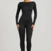 Eulalie Jumpsuit aus geschmeidigem Jersey mit Schleifendetail in Schwarz Eulalie Jumpsuit aus geschmeidigem Jersey mit Schleifendetail in Schwarz