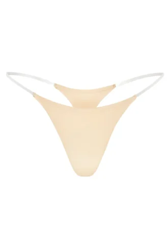 Intimates Nahtloser Strick-String mit transparenten Trägern in Warm Peach