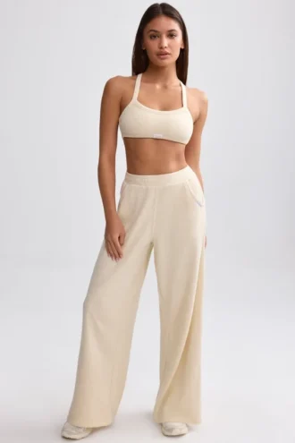Jogginghose aus Frottee mit weitem Bein in Creme Jogginghose aus Frottee mit weitem Bein in Creme