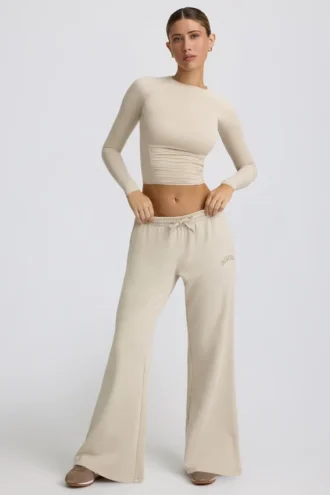 Jogginghose mit niedriger Leibhöhe und weitem Bein in Bone Jogginghose mit niedriger Leibhöhe und weitem Bein in Bone