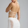 Liberty Bikini-Oberteil mit verzierten Kreuzträgern in Elfenbein Liberty Bikini-Oberteil mit verzierten Kreuzträgern in Elfenbein