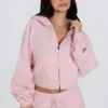 Kurzer Hoodie aus weichem Strick mit Reißverschluss in zartem Rosa Kurzer Hoodie aus weichem Strick mit Reißverschluss in zartem Rosa