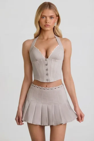 Laika Minirock mit Plissee und niedriger Taille in Ecru Laika Minirock mit Plissee und niedriger Taille in Ecru