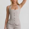 Lalita Playsuit mit Knopfleiste und Neckholder in Ecru Lalita Playsuit mit Knopfleiste und Neckholder in Ecru