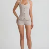 Lalita Playsuit mit Knopfleiste und Neckholder in Ecru Lalita Playsuit mit Knopfleiste und Neckholder in Ecru