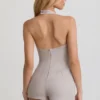 Lalita Playsuit mit Knopfleiste und Neckholder in Ecru Lalita Playsuit mit Knopfleiste und Neckholder in Ecru