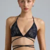 Liberty Bikini-Oberteil mit verzierten Kreuzbändern in Schwarz Liberty Bikini-Oberteil mit verzierten Kreuzbändern in Schwarz