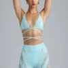 Liberty Bikini-Oberteil mit verzierten Kreuzträgern in Eisblau Liberty Bikini-Oberteil mit verzierten Kreuzträgern in Eisblau