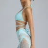 Liberty Bikini-Oberteil mit verzierten Kreuzträgern in Eisblau Liberty Bikini-Oberteil mit verzierten Kreuzträgern in Eisblau