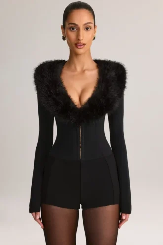 Nesta Playsuit mit Kunstfellbesatz in Schwarz