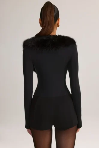 Nesta Playsuit mit Kunstfellbesatz in Schwarz