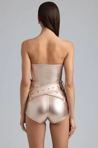 Sasha Metallic-Denim-Playsuit mit Gürtel und Korsett in Champagner