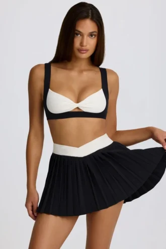 Soft Active Crossover-Minirock mit Falten in Schwarz Soft Active Crossover-Minirock mit Falten in Schwarz