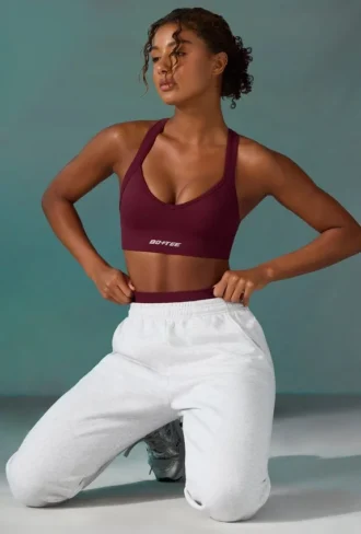 Super Sculpt nahtloser Sport-BH mit gekreuztem Rücken in Pflaume Super Sculpt nahtloser Sport-BH mit gekreuztem Rücken in Pflaume