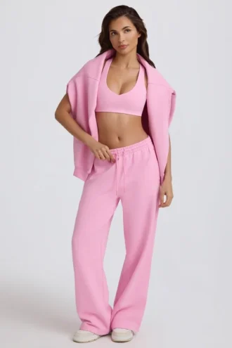 Weiche Jogginghose aus Baumwolljersey mit mittlerer Leibhöhe und weitem Bein in Babyrosa Weiche Jogginghose aus Baumwolljersey mit mittlerer Leibhöhe und weitem Bein in Babyrosa