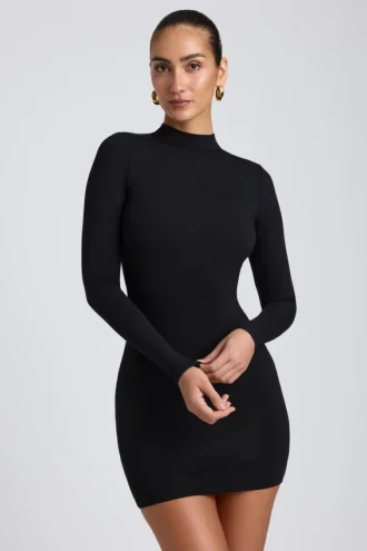Yara Modal-Minikleid mit offenem Rücken und langen Ärmeln in Schwarz Yara Modal-Minikleid mit offenem Rücken und langen Ärmeln in Schwarz